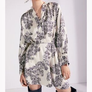 A-line dress in slightly draped satin.